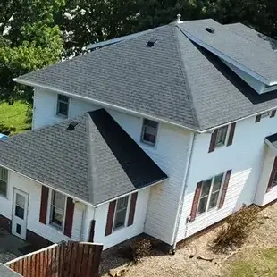 Home with new gray shingles installed